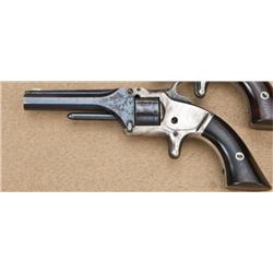 Smith & Wesson 1st model 2nd issue, .22 caliber  revolver, blue and silver finish, varnish rose  woo