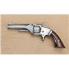 Image 2 : Smith & Wesson first model second issue, .22  caliber revolver, blue and silver finish, varnish  woo