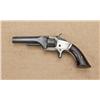 Image 2 : Smith & Wesson first model second issue, .22  caliber revolver, blue and silver finish, varnish  woo