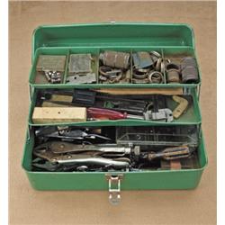 Tinkerer’s lot of various small gun parts,  springs, screws, tools, etc. Nothing good, but  possibly