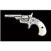 Image 1 : Colt .22 caliber 7-shot Opentop or Old Line  revolver, period scroll engraved, nickel plated,  pearl
