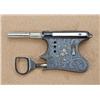 Image 1 : Fancy European palmsqueezer pistol with ring type  activator mounted on forward of frame, fed by  ma