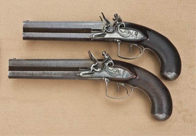 A pair of rare double-barrel over/under flintlock pistols with ...