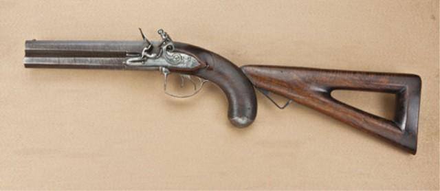 A pair of rare double-barrel over/under flintlock pistols with ...
