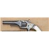 Image 1 : Smith & Wesson first model 2nd issue .22 caliber  revolver, blue and silver finish, original pearl  