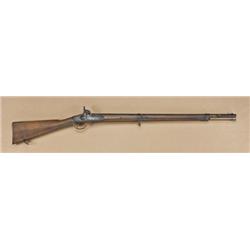 Enfield style .58 caliber percussion two-band  rifle with provision for saber bayonet. Lock shows  “
