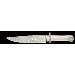 Fancy blued and gold decorated Bowie knife by  Gigand, serial #0755. Shows portrait of Jim Bowie  an