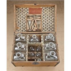 19th century Whiskey salesman’s case, containing 7  large blown-glass and etched quart sized bottles