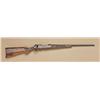 Image 1 : Winchester model 70 XTR featherweight .243  caliber, bolt-action rifle, custom engraved and  gold in