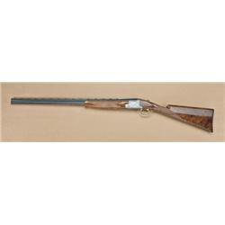 Browning 410ga Superposed over/under shotgun,  superlight Pointer grade, 28” barrels, single  trigge