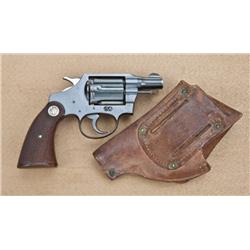 Colt detective special, .38 special, 2” barrel  revolver, commercial blued finish, checkered wood  m