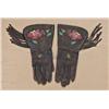 Image 1 : Pair of beaded buckskin gauntlets in display.  Gauntlets measure approx. 14” and show dark  stained 