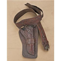 Lot of three Western style holsters including: 1)  Double-loop holsters with matching cartridge belt