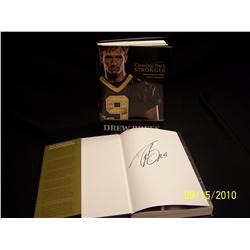 Signed copy of "Coming Back Stronger" by Drew Brees & Two Purdue Pumpkins