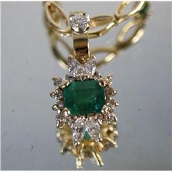 14kt Gold emerald pendant w diamonds & 925 chain 4 Marquis Diamonds, 3 round cut & app. 10 small dia