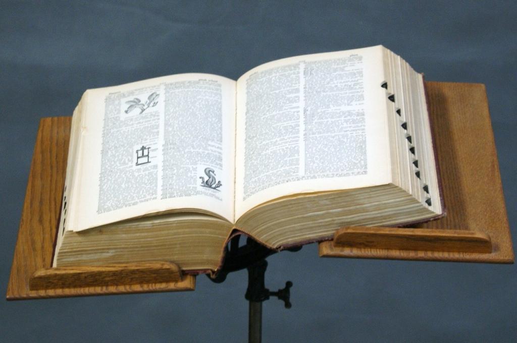 Antique cast iron Dictionary stand w dictionary