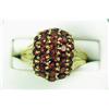 Image 1 : Stylish 10K YG Ladies Dome Design Ring Fine set with thirty-three fine red garnets weighing approx. 
