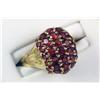 Image 2 : Stylish 10K YG Ladies Dome Design Ring Fine set with thirty-three fine red garnets weighing approx. 