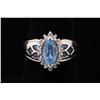 Image 1 : Beautiful 10K Yellow Gold Ladies Ring Set with three blue Topaz weighing approx 5.00 carats and surr