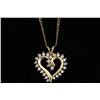Image 1 : 1/2Ct Total Weight Diamond Heart With a 17"  chain. All 10K yellow gold.With a 17"  chain. All 10K y