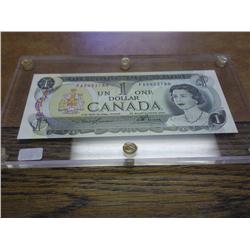 1973 CANADA $1 CURRENCY (GEM CU) IN LUCITE HOLDER
