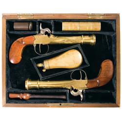 Custom Cased Matched and Consecutively Serial Numbered Pair of Gold Gilted Brass European Percussion