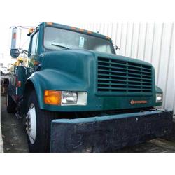 1990 GREEN INTERNATIONAL NAVSTAR TOW TRUCK