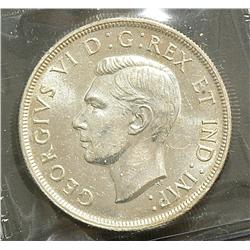 Dollar 1946, graded ICCS MS-62.