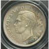 Image 1 : Dollar 1952, graded PCGS PL-64. No Water Line. Light toning.