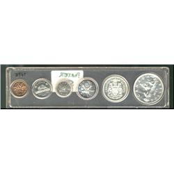 Proof-like set, 1959, in plastic year set.  An average set with lightly toned coins.  The cent is to