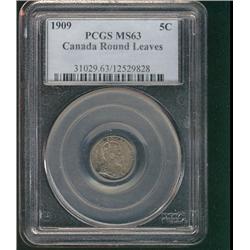 1909 5¢ Round Leaves PCGS MS63.  Toned with light lustre.