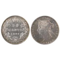 1899 50¢ PCGS MS62/ICCS MS60, brilliant and lustrous.  A very flashy example.  Very rare date.