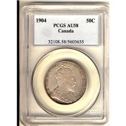 1904 50¢ PCGS AU58.  A sharp key issue with a cream like rosy pink finish.  Should be viewed.