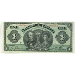 1911 $1 DC-18c #390746J.  A solid VF with a couple pinholes.