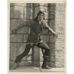 Collection of nine photos of Douglas Fairbanks Sr., from Robin Hood and The Gaucho