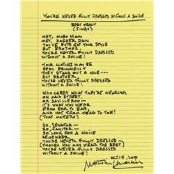 Martin Charnin autograph manuscript lyrics to “You’re Never Fully Dressed Without a Smile”
