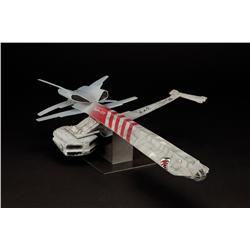 Space Rangers filming miniature “Lizzie” spaceship, together with (3) other props