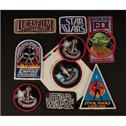 Collection of Industrial Light and Magic employee Star Wars patches and car window sticker