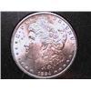 Image 1 : 1884-CC Morgan Dollar MS62. Brilliant with slight toning. In the original GSA case.