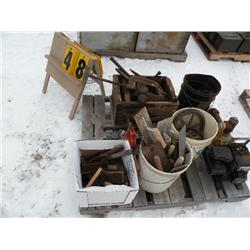 rigid pipe cutter; trowels; wire brushes; assortment of tools