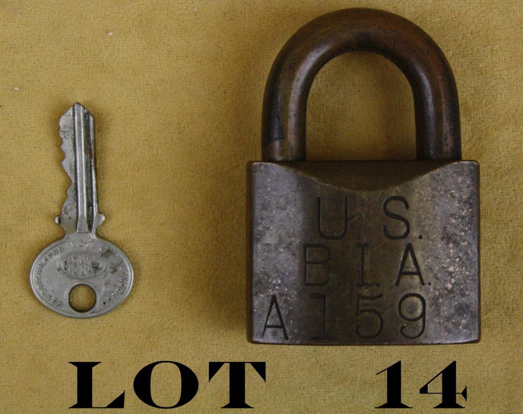 Old brass lock with key, approx. 3” x 2” showing a great brown patina ...