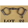 Image 1 : Pair of old handcuffs with key marked Hiatt  and British Made in overall fair condition  showing sca