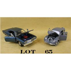 Lot of two collectible toy cars including a  metal 1968 Plymouth Road Runner Hemi in  overall very g