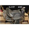 Image 1 : Fancy child’s tooled leather saddle in  overall good condition with wooden stirrups  and leather tra