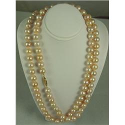 Very high quality ladies opera length strand  of round Natural peach color pearls(Not Dyed)  averagi
