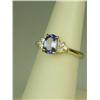 Image 2 : Splendid 14 karat yellow gold ladies ring set  with a center oval cut Tanzanite weighing  approx. 1.
