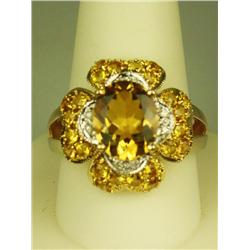 Fabulous 14 karat heavy yellow gold ladies  Italian design ring set with a center oval  citrine weig