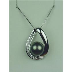Stunning 14 karat white gold ladies custom  made pendant set with a center round Tahitian  black pea