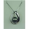 Image 1 : Stunning 14 karat white gold ladies custom  made pendant set with a center round Tahitian  black pea