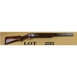 Browning Citori O/U shotgun, 12 gauge, 26”  ventilated rib barrels, blue finish,  checkered wood sto